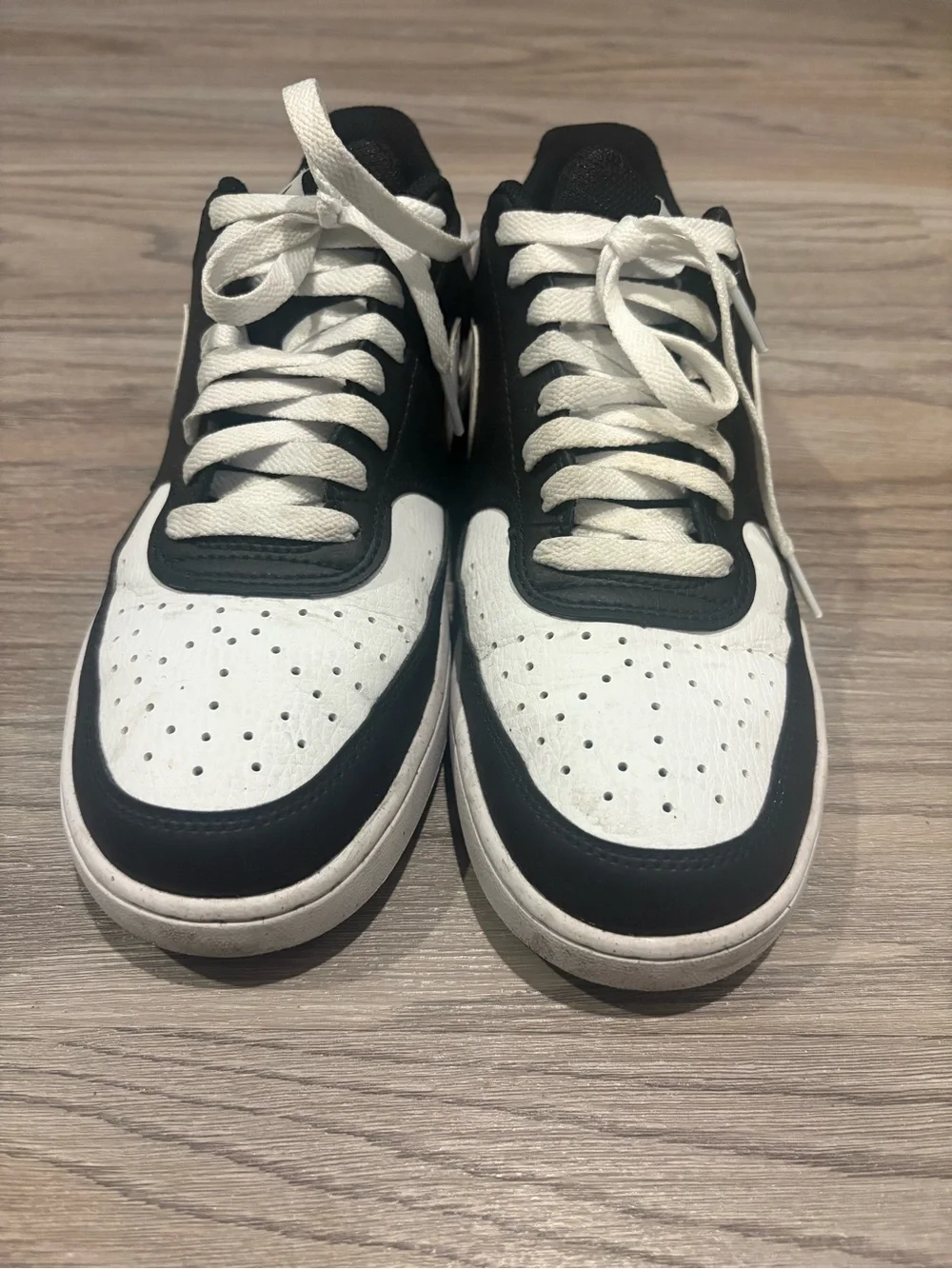 Nike Women’s Black and White Low-Top Sneakers with White Swoosh